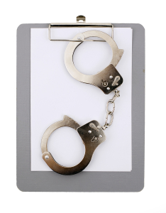 handcuff and empty clipboard
